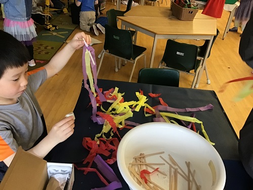JKK child choosing streamers for comet