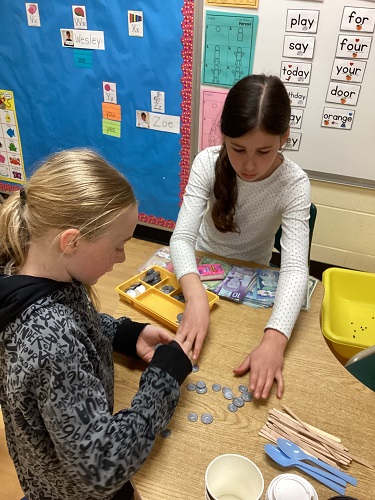 Sorting money for the coffee shop