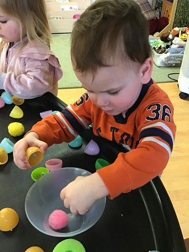 Finding pom pom inside egg