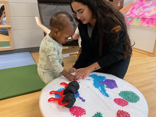 child with educator