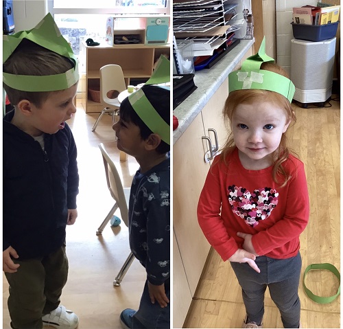 children with dinosaur headbands on
