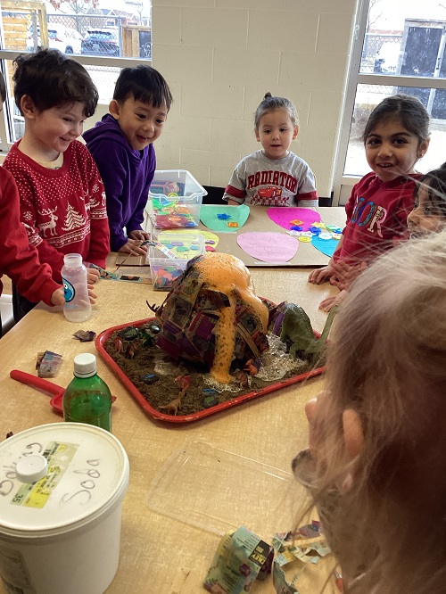 children watching the volcano errupt