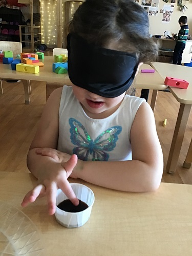 child test tasting blindfolded