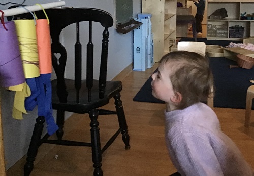 children looking at wind socks